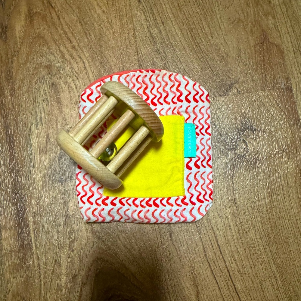 Lovevery crinkle bag and bell rattle